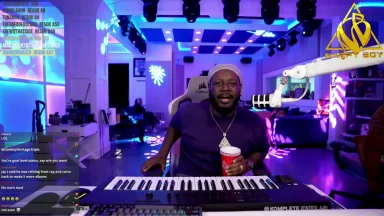 Streamer in neon-lit studio with keyboard and mic