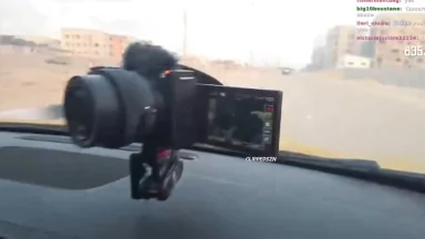 Camera mounted on car dashboard filming road