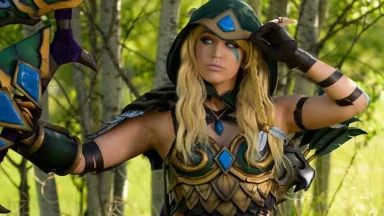 Fantasy archer in green armor holding bow