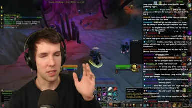 Gamer streaming World of Warcraft with chat overlay.