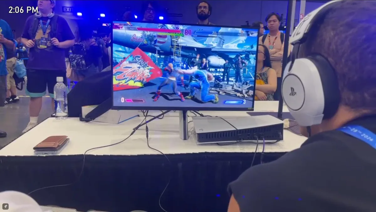 Person playing fighting game at gaming convention