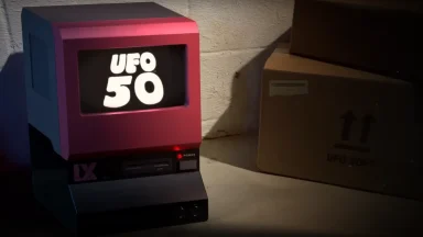 Retro computer displaying UFO 50 logo screen