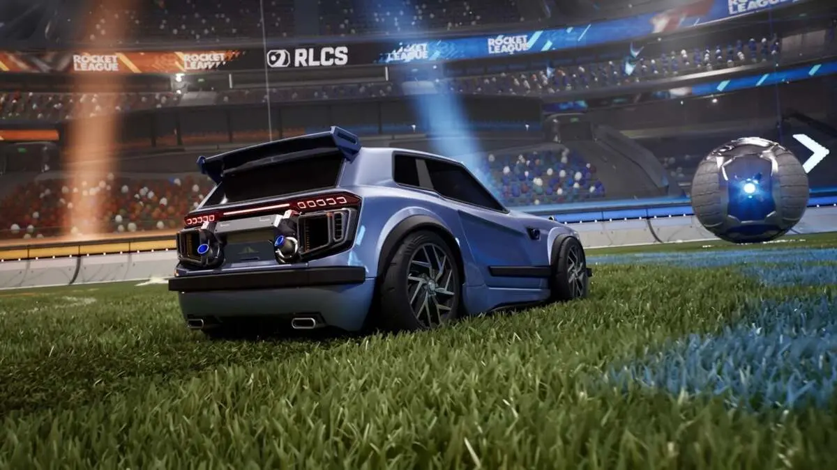 Rocket League car on stadium field with ball