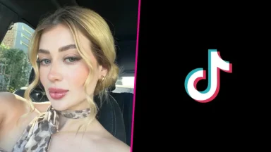 Woman in car selfie with TikTok logo.