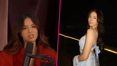 Two women posing, one speaking into microphone