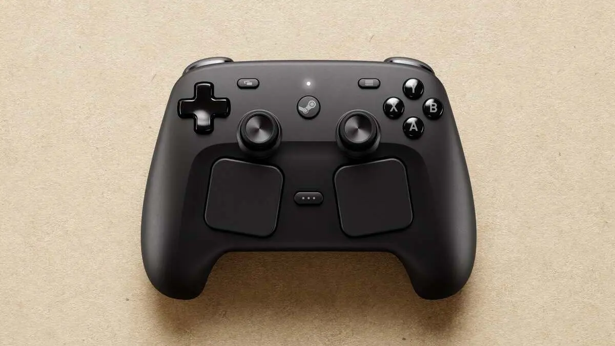 Black Steam controller on beige background