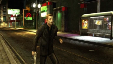 Armed man running on neon-lit city street at night
