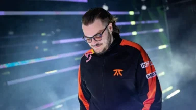 Esports player in Fnatic jacket on stage
