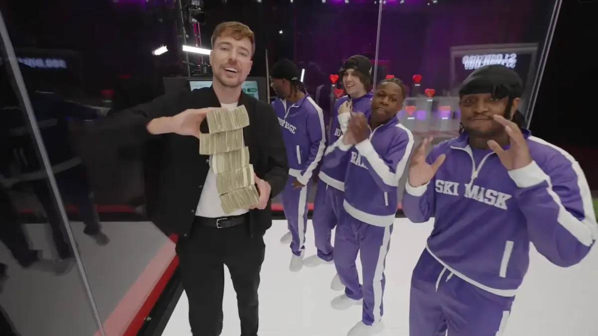 Man holding stacks of cash with group in purple tracksuits