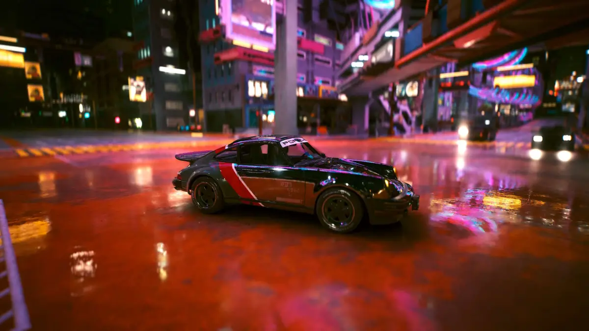 Sports car on wet neon city street