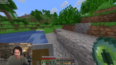 Minecraft gameplay near river with streamer facecam