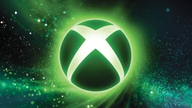 Glowing green Xbox logo on abstract background