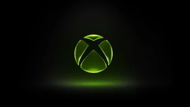 Glowing green Xbox logo on black background