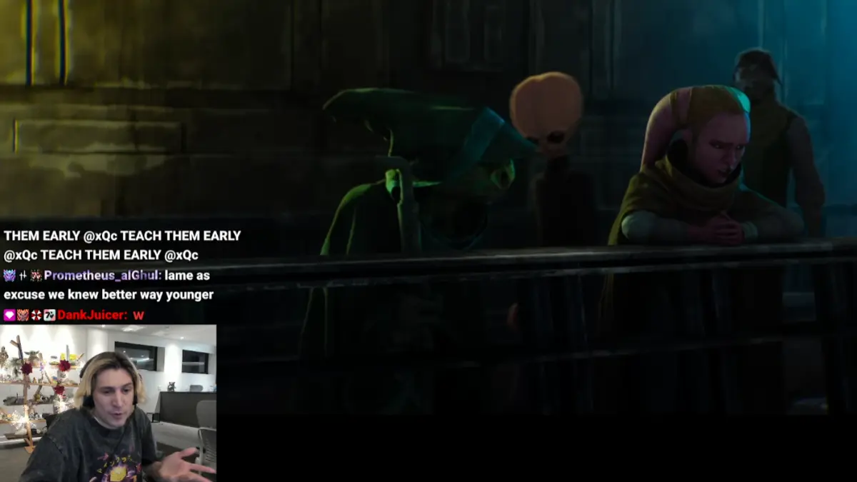 Streamer reacting to scene with alien characters in game