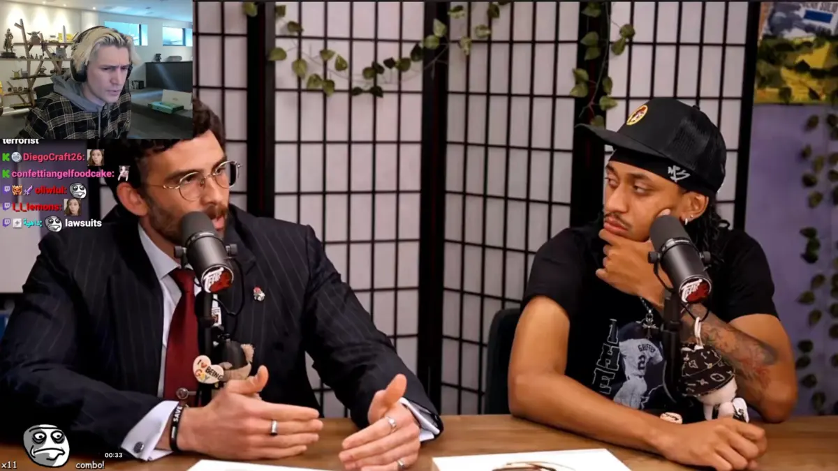 Two men speaking on a podcast set